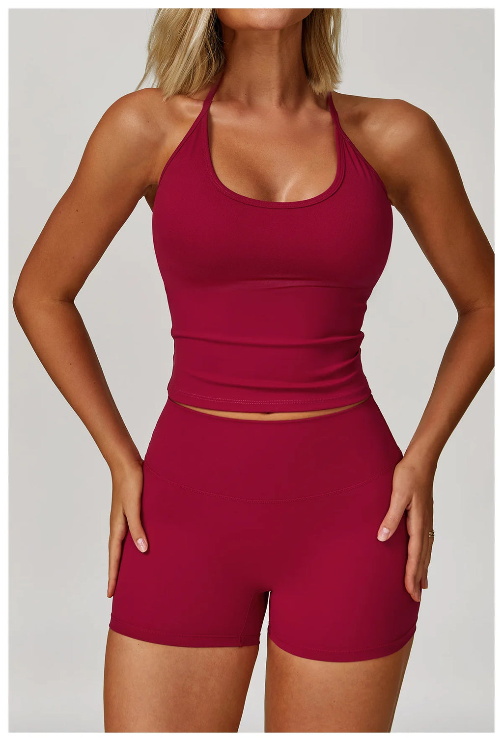 Xooie Fit women's matching activewear set featuring a maroon tank top and shorts for a stylish workout look