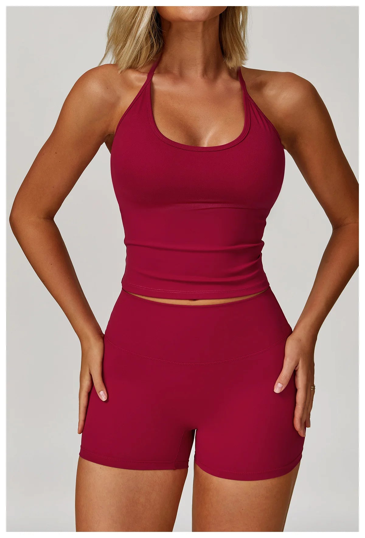 Xooie Fit women's matching activewear set featuring a maroon tank top and shorts for a stylish workout look