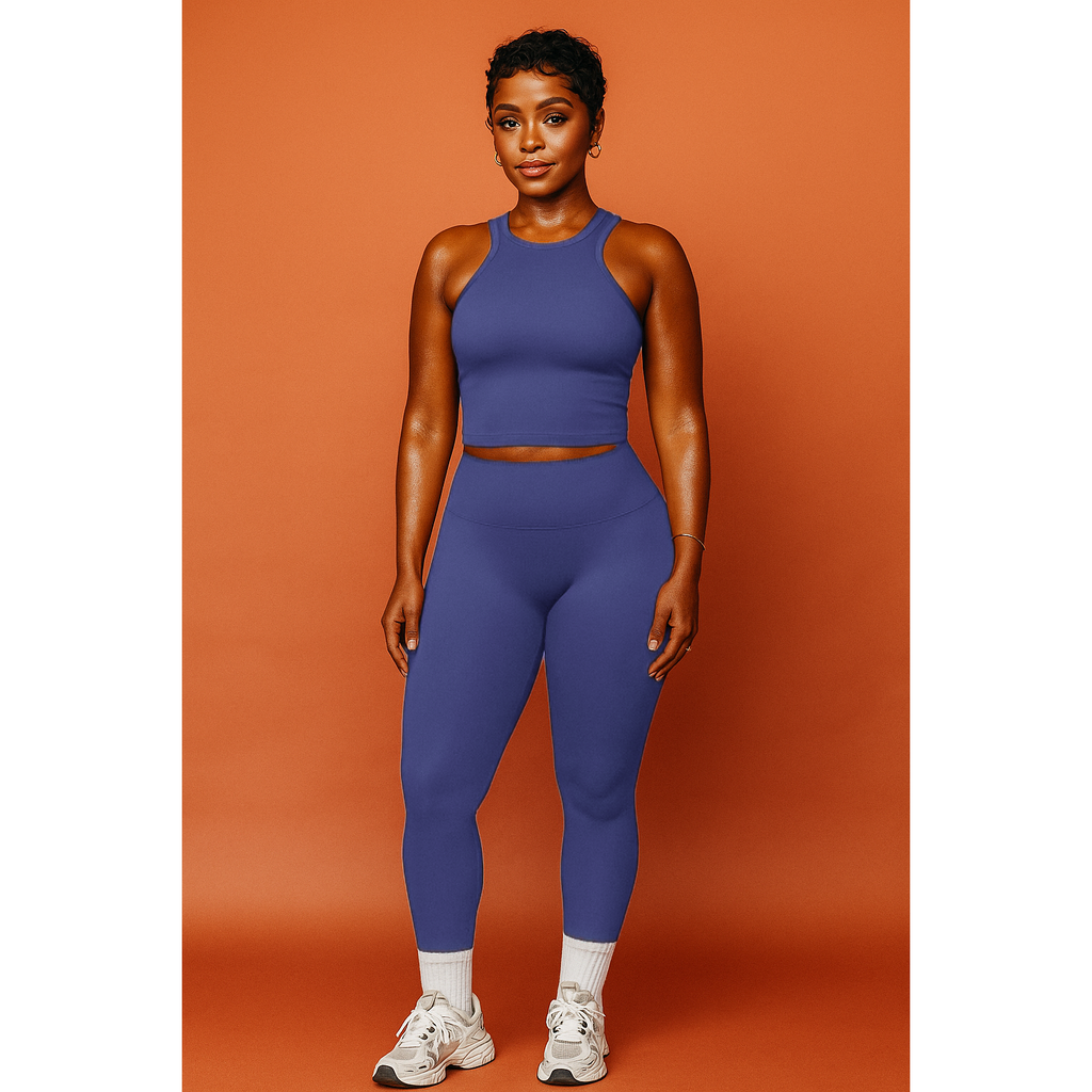 Xooie Fit women's matching workout set in purple featuring a sleeveless crop top and high-waisted leggings