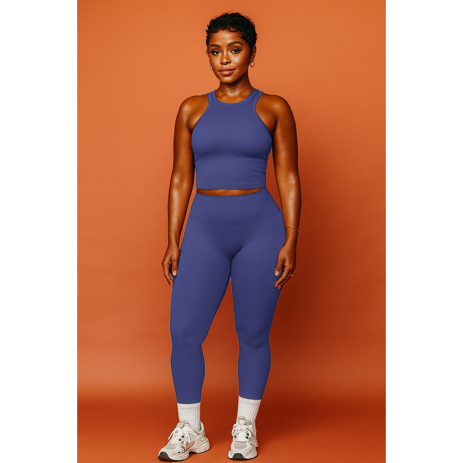 Xooie Fit women's matching workout set in purple featuring a sleeveless crop top and high-waisted leggings