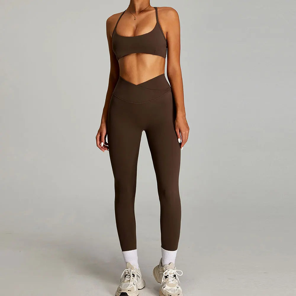 Xooie Fit women's matching workout set in brown featuring a crop top and high-waisted leggings