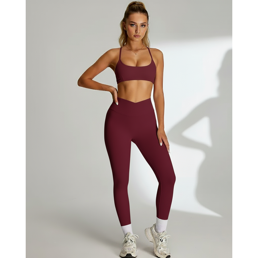 Xooie Fit women's matching workout set in burgundy with a sports bra and high-waisted leggings