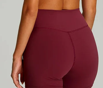 Back view of Xooie Fit women's matching workout set in burgundy with comfortable fit