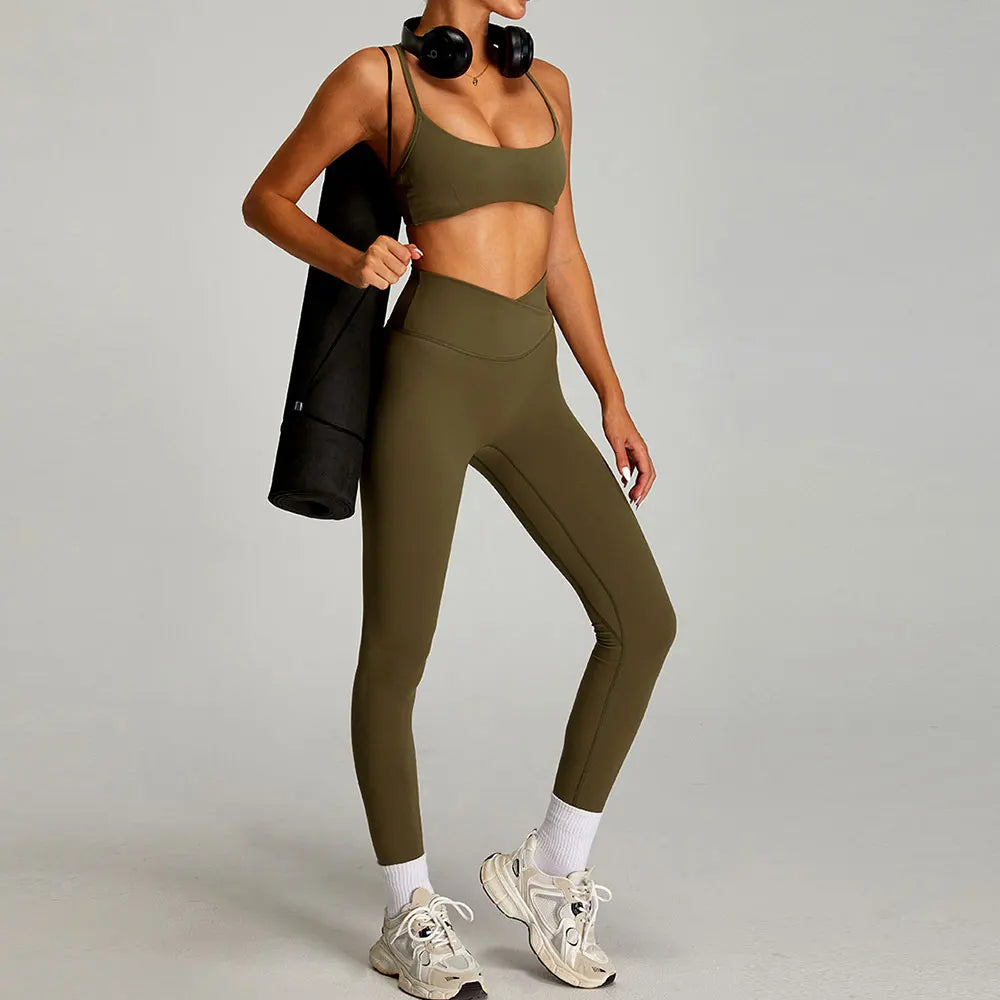 Xooie Fit women's matching workout set in olive green with high-waisted leggings and sports bra