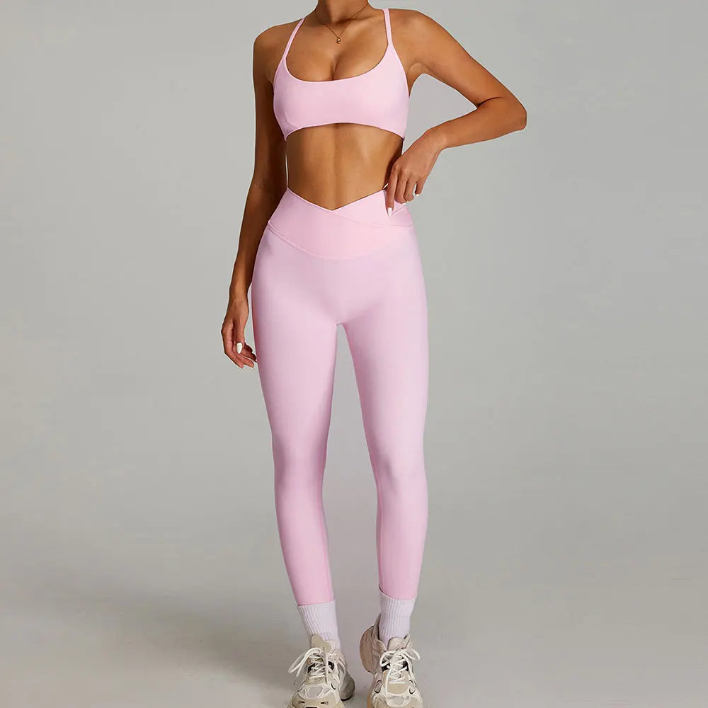 Xooie Fit women's matching workout set in light pink for stylish gym sessions