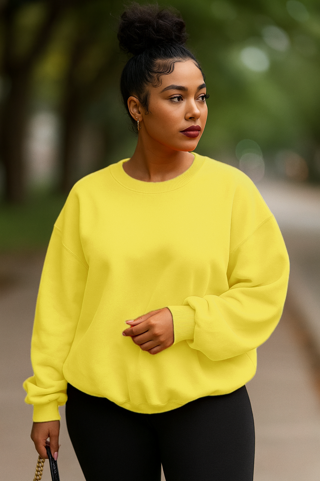 Bright yellow women's oversized sweatshirt from Xooie Fit for casual and stylish wear