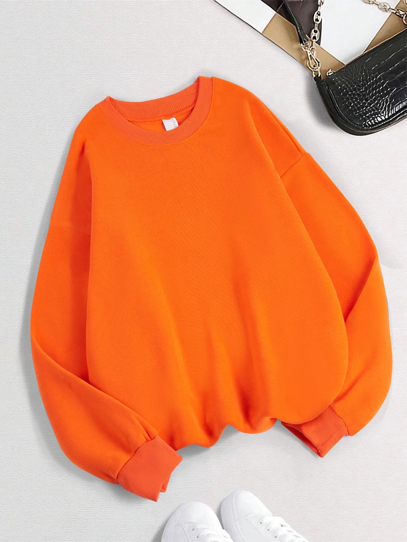Xooie Fit women's oversized sweatshirt in bright orange with comfortable fit and stylish design