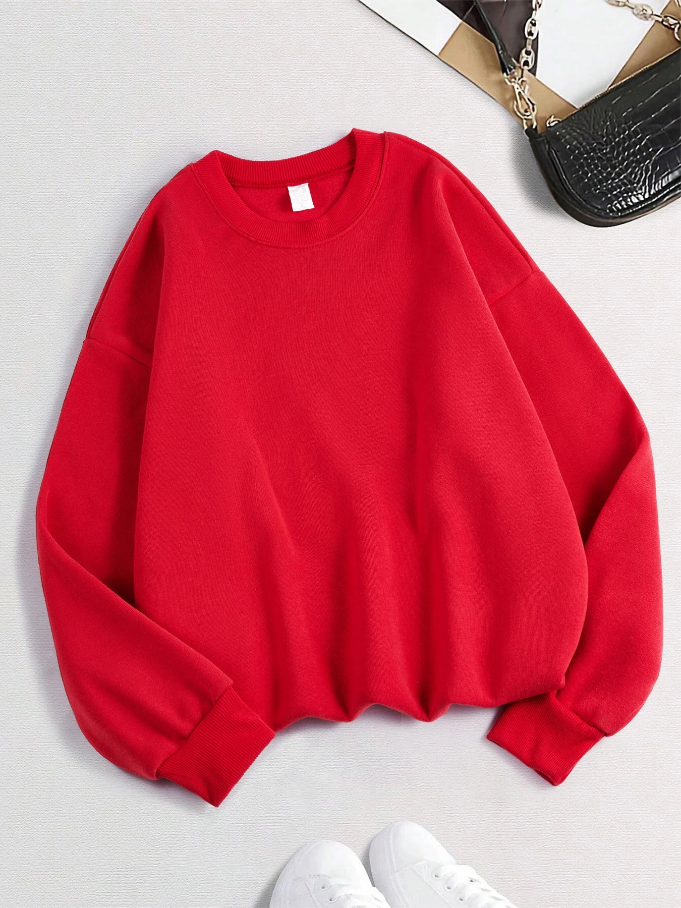 Red women's oversized sweatshirt from Xooie Fit with a relaxed fit and comfortable style