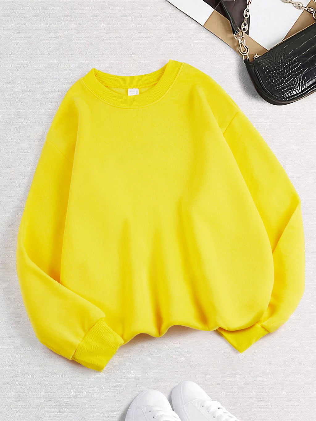Xooie Fit women's oversized sweatshirt in bright yellow perfect for casual, comfortable wear