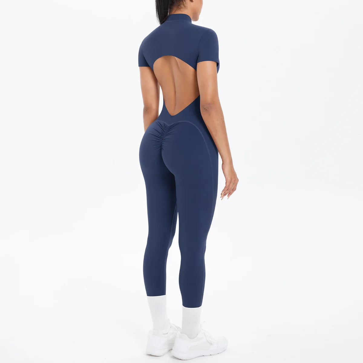 Xooie Fit women's short sleeve jumpsuit activewear in navy with a stylish cut-out back design