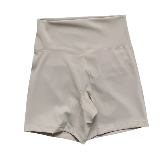 Xooie Fit women's stretchy workout shorts in light beige for comfortable and flexible exercise.