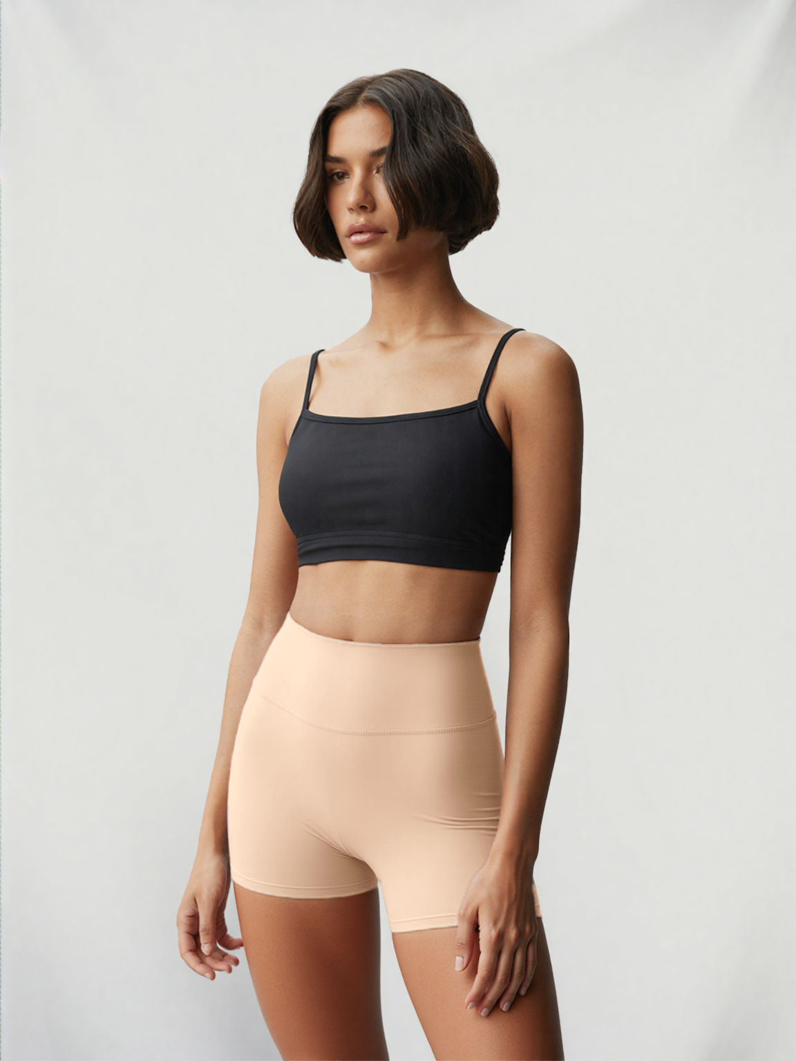 Xooie Fit women's stretchy workout shorts in peach color designed for comfort and flexibility during exercise