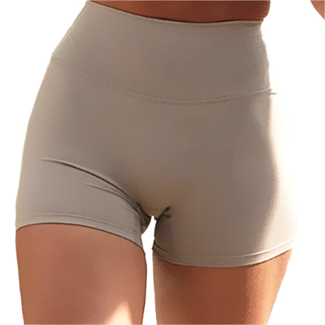 Xooie Fit women's stretchy workout shorts in light beige, perfect for comfort and flexibility during exercise