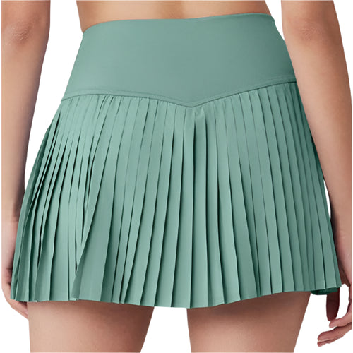 Xooie Fit women's tennis skort with phone pockets featuring a pleated design in green