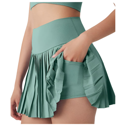 Xooie Fit women's tennis skort with phone pockets in green featuring pleated design