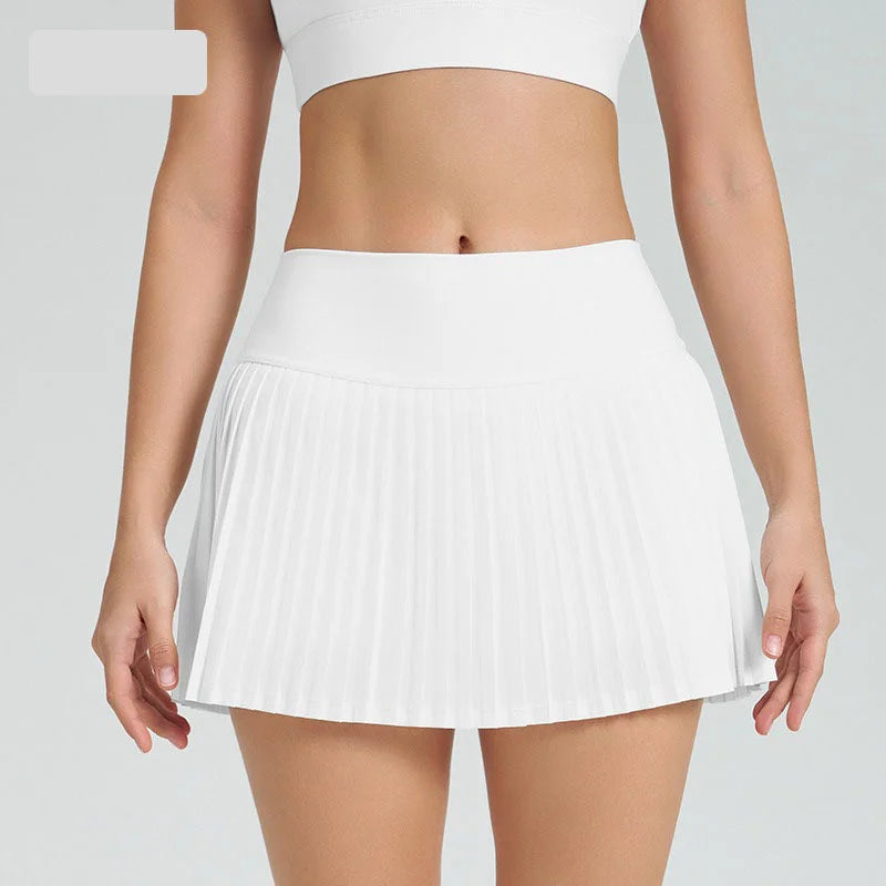 Xooie Fit women's tennis skort with phone pockets in white, perfect for active wear and sports