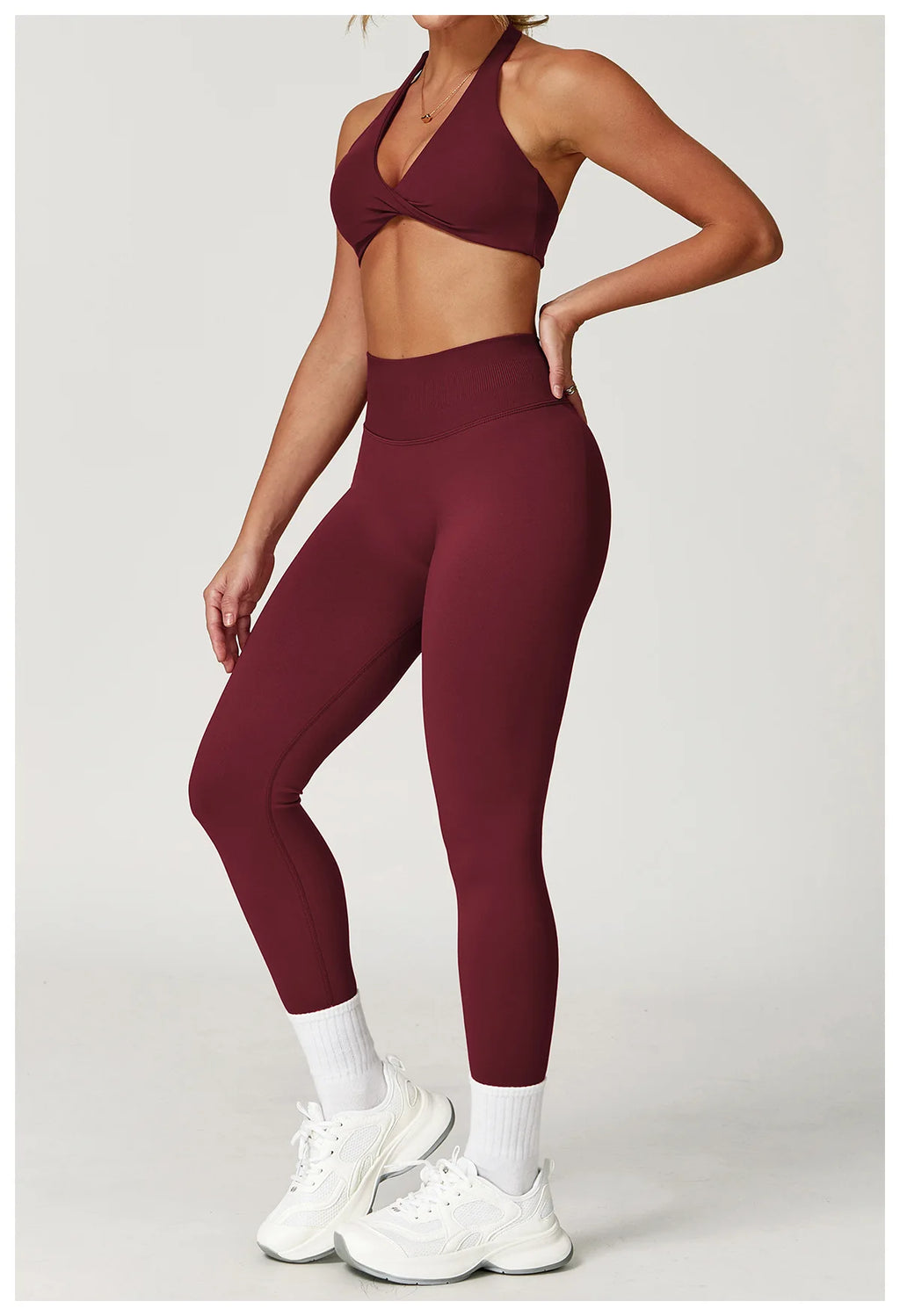 Stylish women's twist bra and high waist leggings set in burgundy by Xooie Fit for activewear enthusiasts