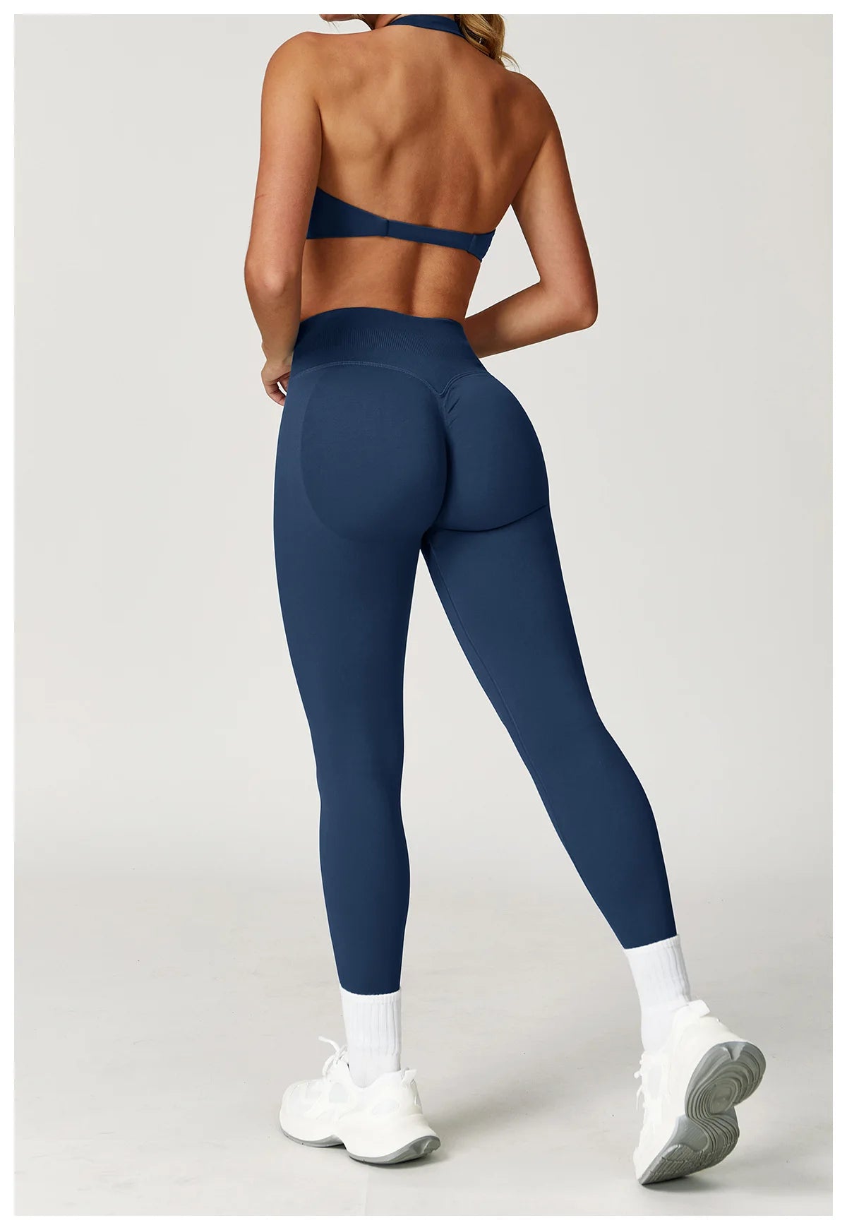 Xooie Fit women's twist bra and high waist leggings set in blue, ideal for workouts and activewear.