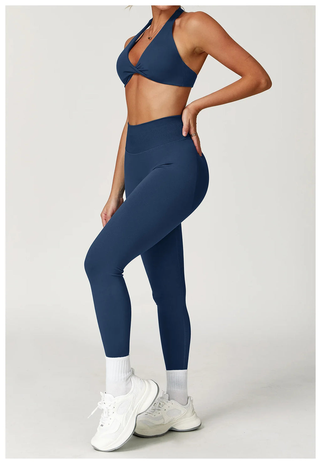 Xooie Fit women's twist bra and high waist leggings set in navy blue for a stylish workout look