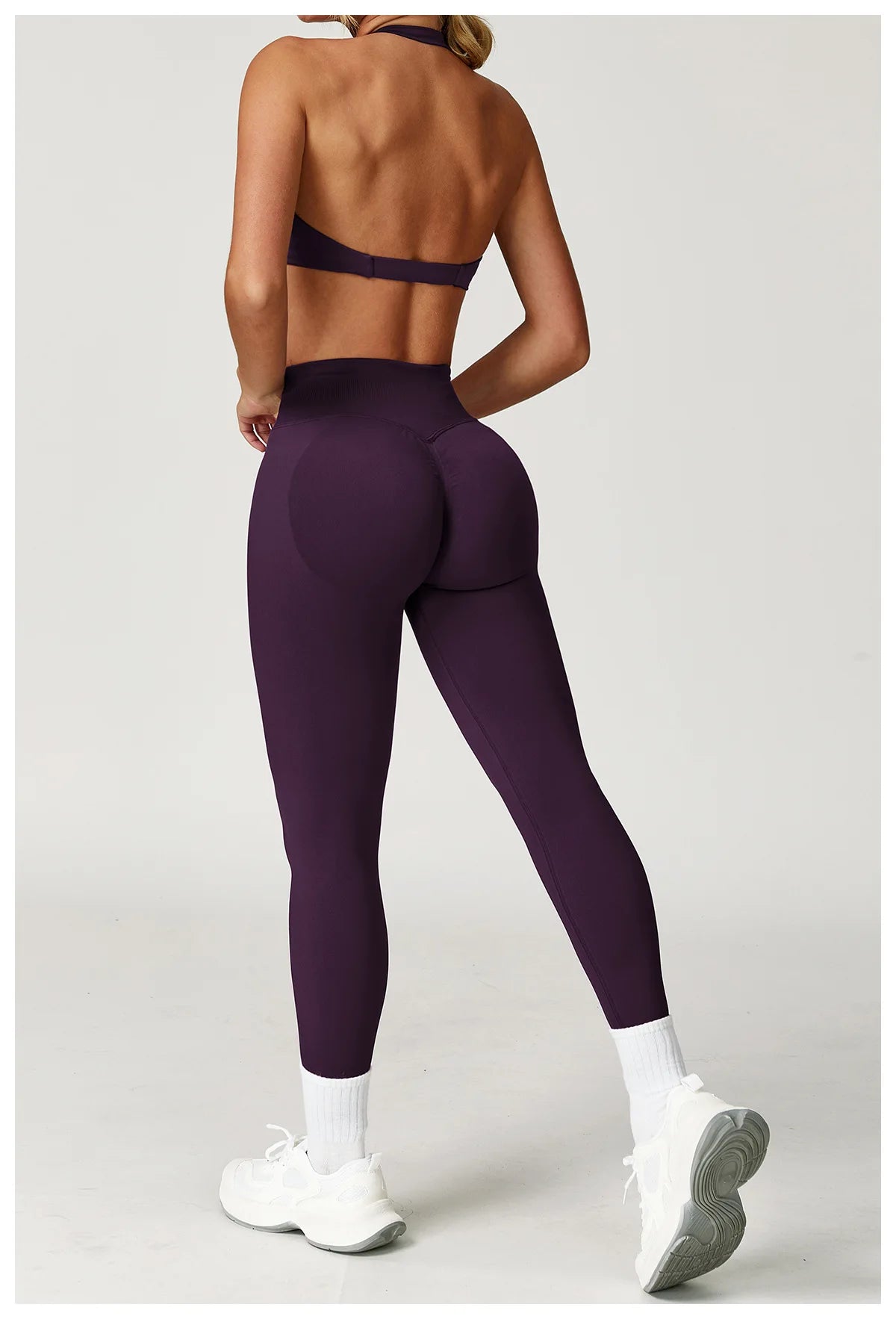 Xooie Fit women's twist bra and high waist leggings set in purple for stylish activewear