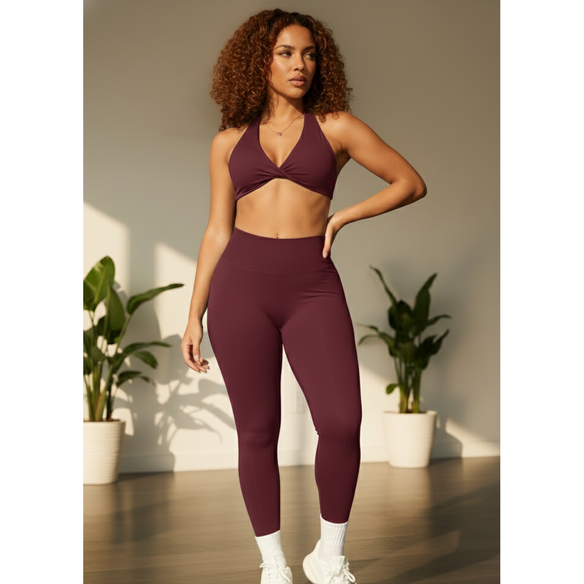Xooie Fit women's twist bra and high waist leggings set in burgundy, perfect for workouts and stylish loungewear