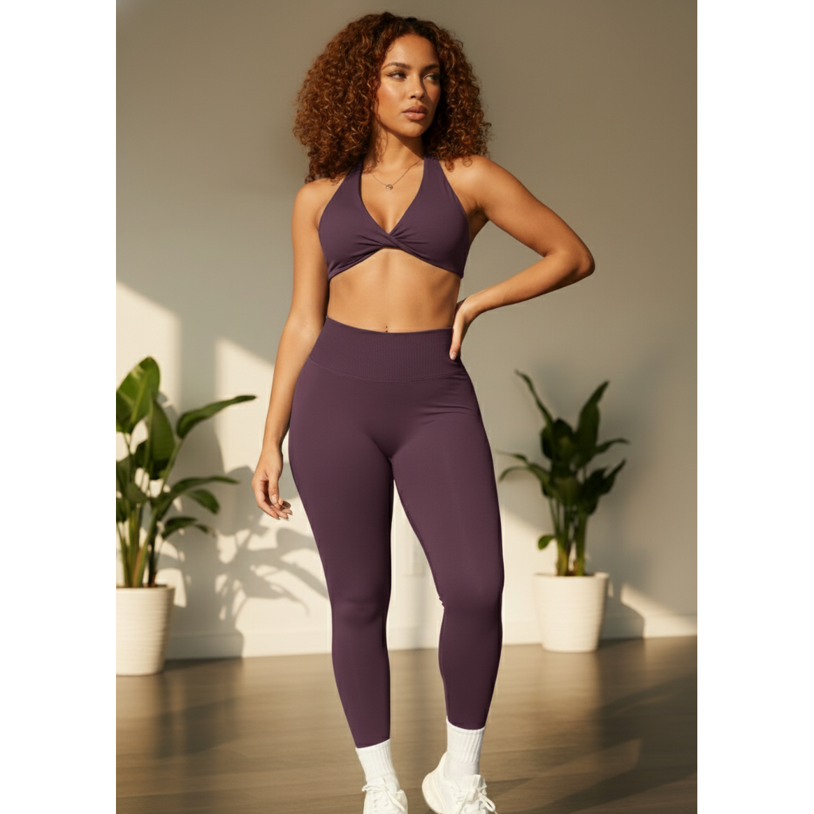 Xooie Fit women's twist bra and high waist leggings set in purple, perfect for workouts and casual wear
