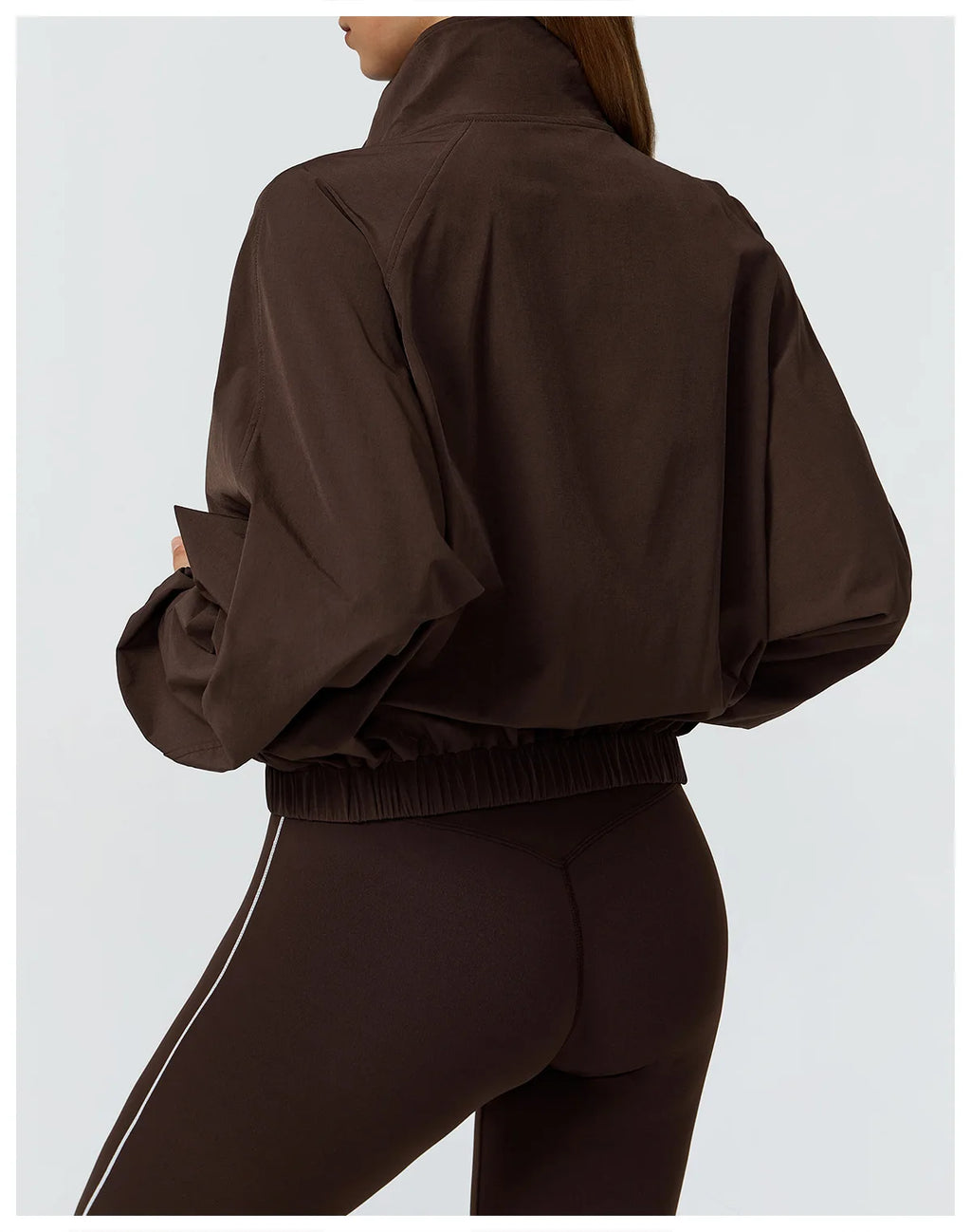 Women's windproof fitness jacket by Xooie Fit with a stylish design and comfortable fit