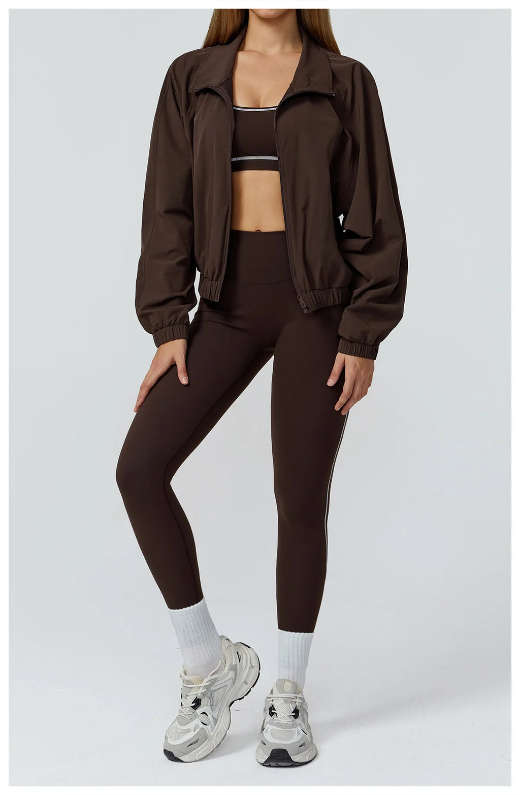 Xooie Fit women's windproof fitness jacket in brown, perfect for outdoor workouts and casual wear