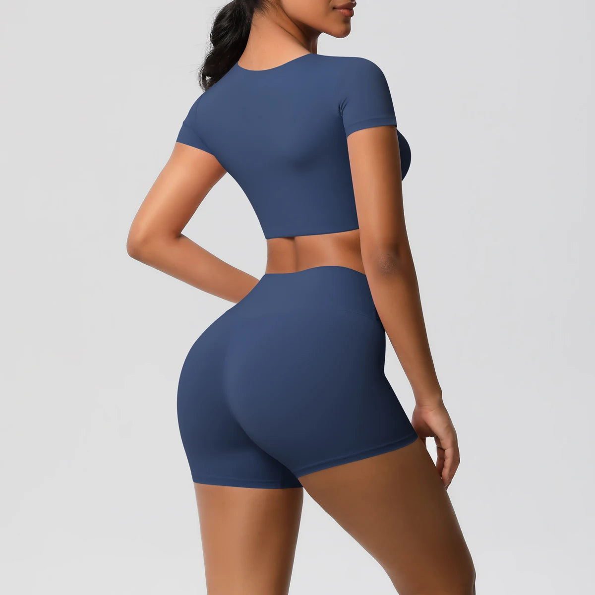 Xooie Fit women's workout crop top and shorts set in navy blue with a fitted design
