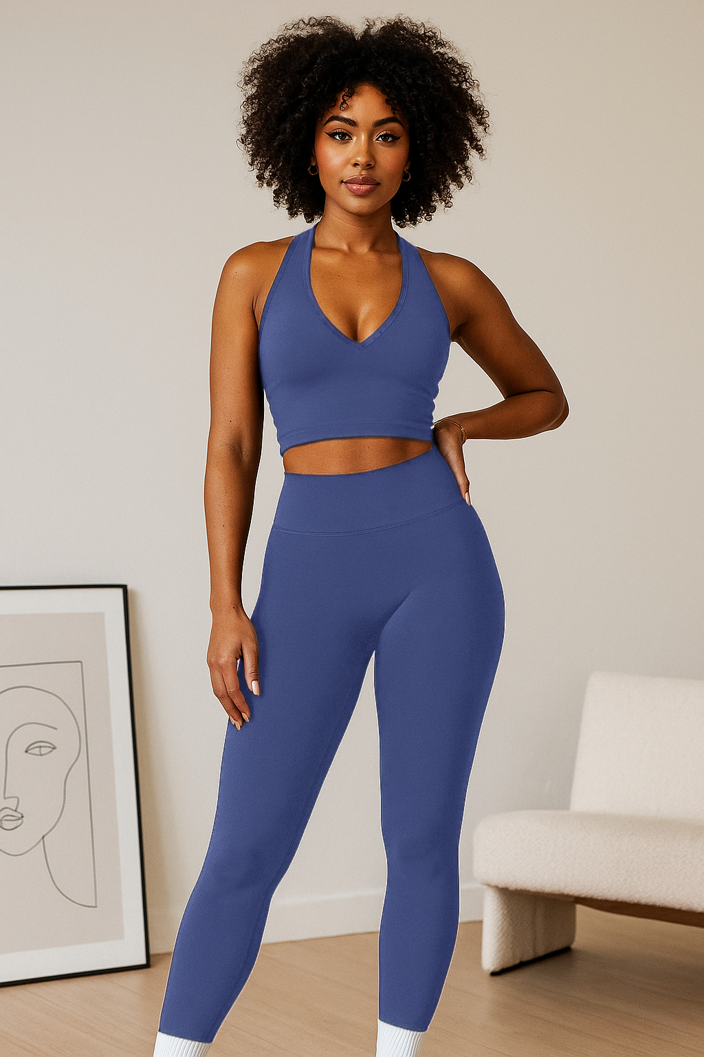 Xooie Fit women's workout matching set in blue featuring a sleeveless crop top and high-waisted leggings