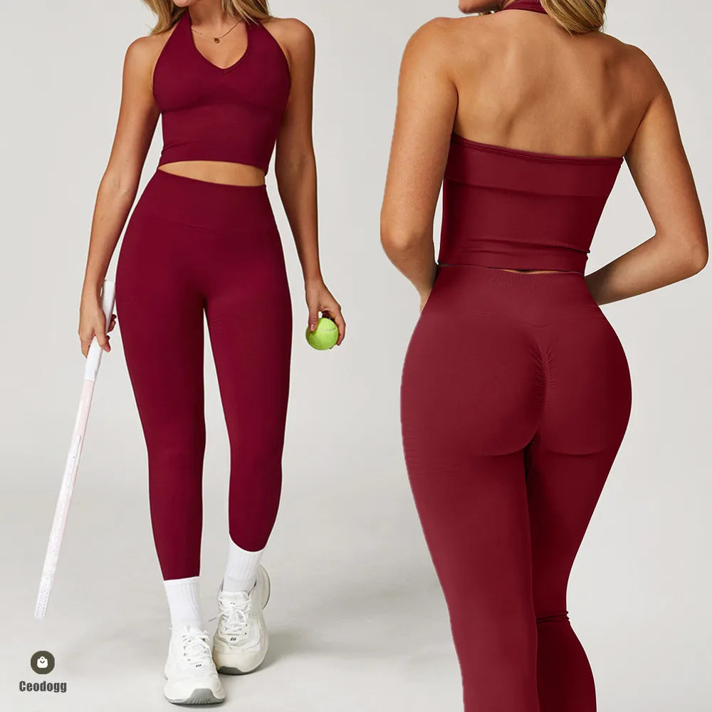 Xooie Fit women's workout matching set in burgundy featuring high-waisted leggings and a halter crop top