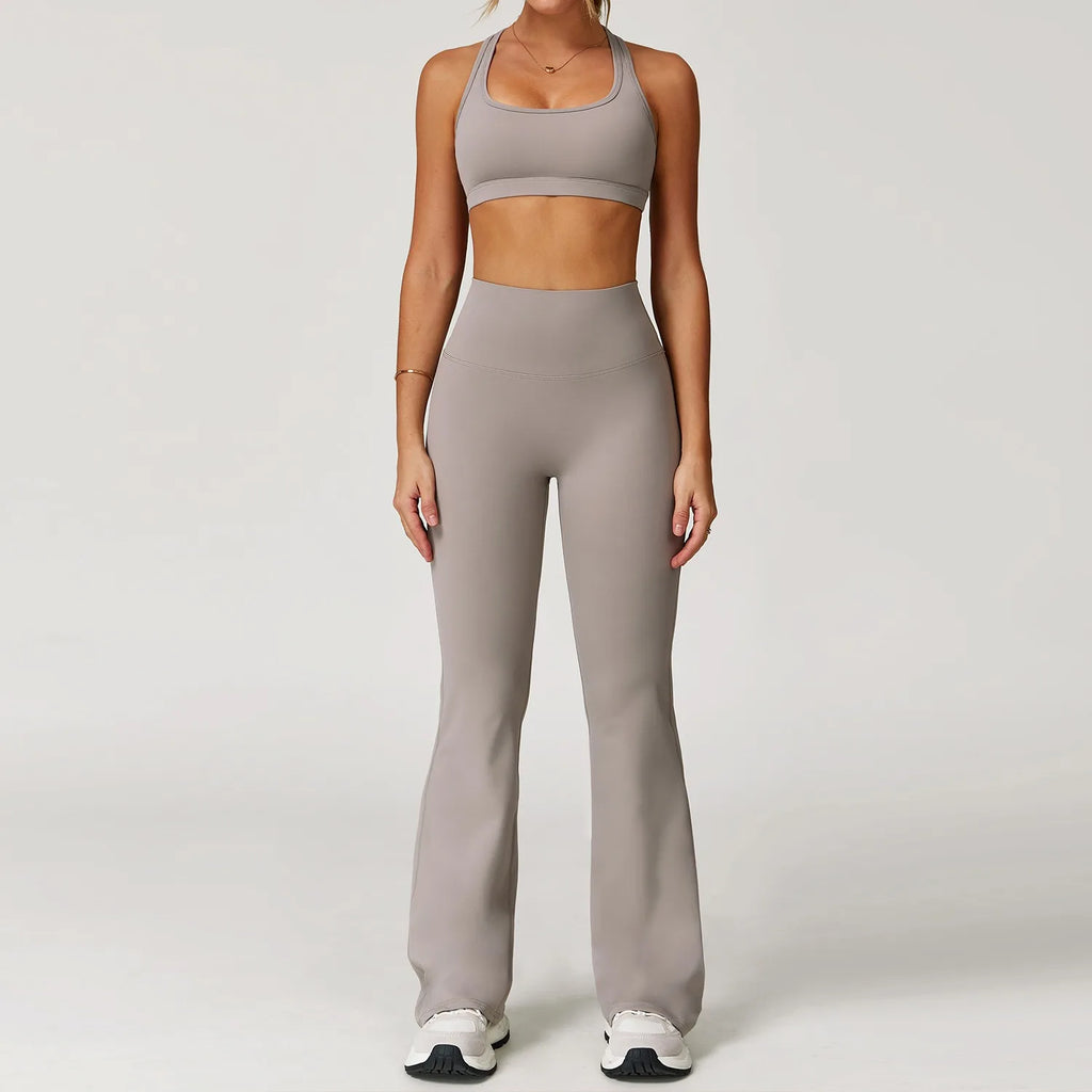Xooie Fit two-piece women's workout set flared pants in beige with matching sports bra