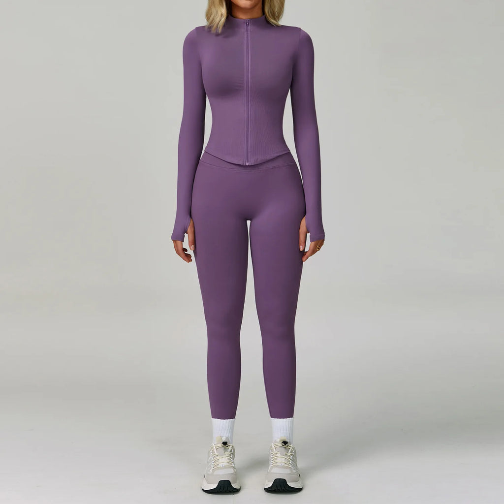 Xooie Fit women's workout set featuring a long sleeve top and matching leggings in purple
