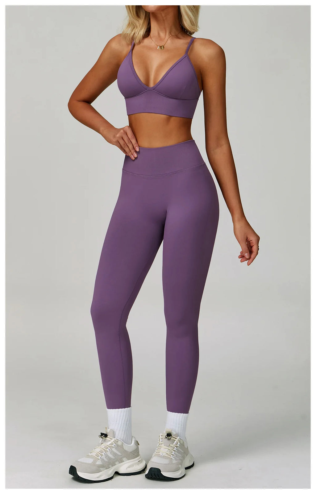 Xooie Fit women's workout set featuring a stylish purple sports bra and leggings for comfort and performance