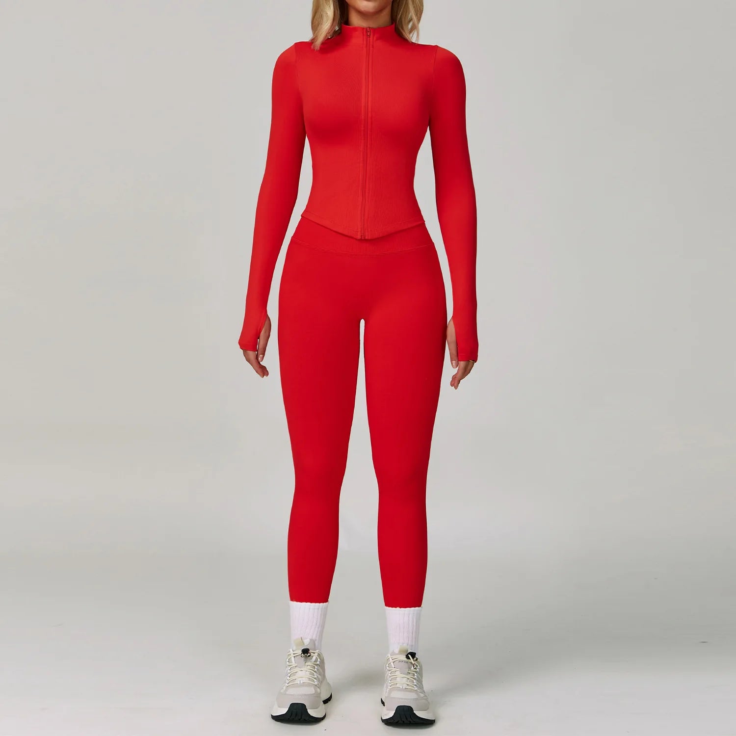 Xooie Fit women's workout set in vibrant red featuring a full zip top and form-fitting leggings