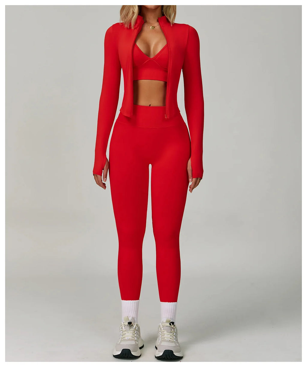 Xooie Fit women's workout set in vibrant red featuring a sports bra and high-waisted leggings