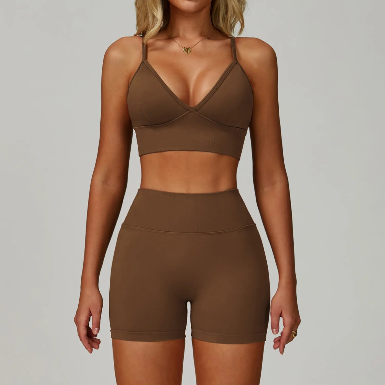 Xooie Fit women's workout set sports bra and shorts in brown for comfortable exercise and training