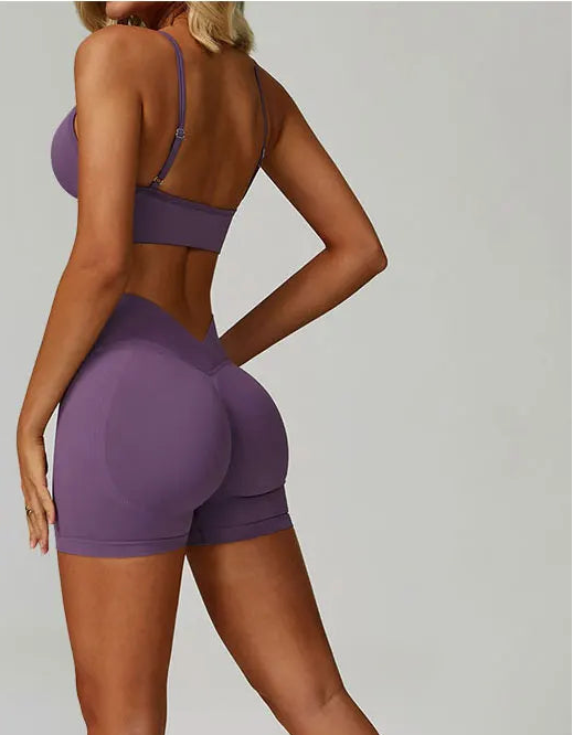 Xooie Fit women's workout set sports bra and shorts in purple with long sleeves and flattering fit