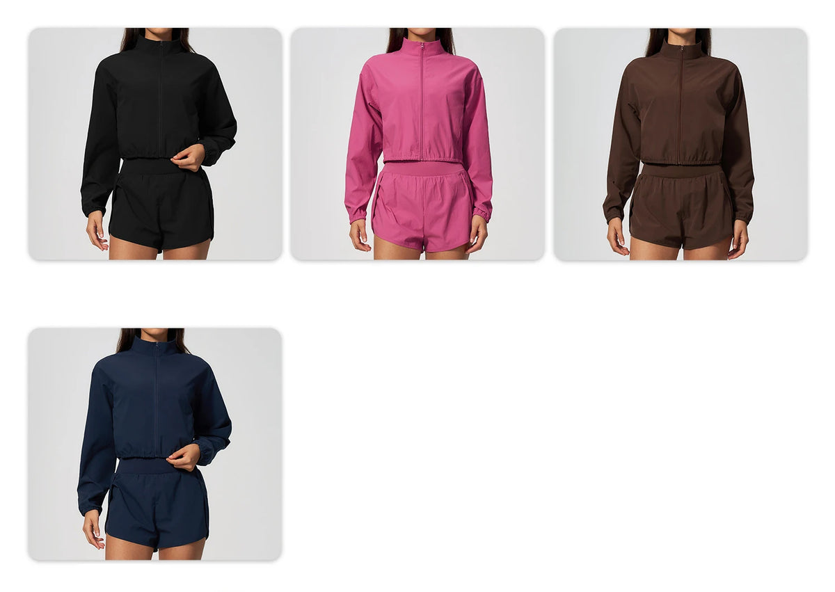 Zip-up windbreaker jacket and shorts set shown in black, pink, and brown