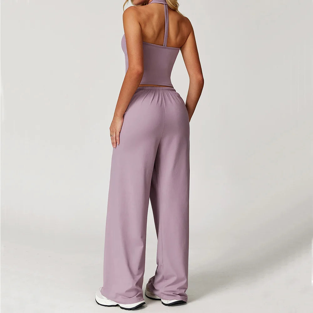 Xooie Fit tank top and baggy pants workout outfit in lavender for comfortable exercise wear