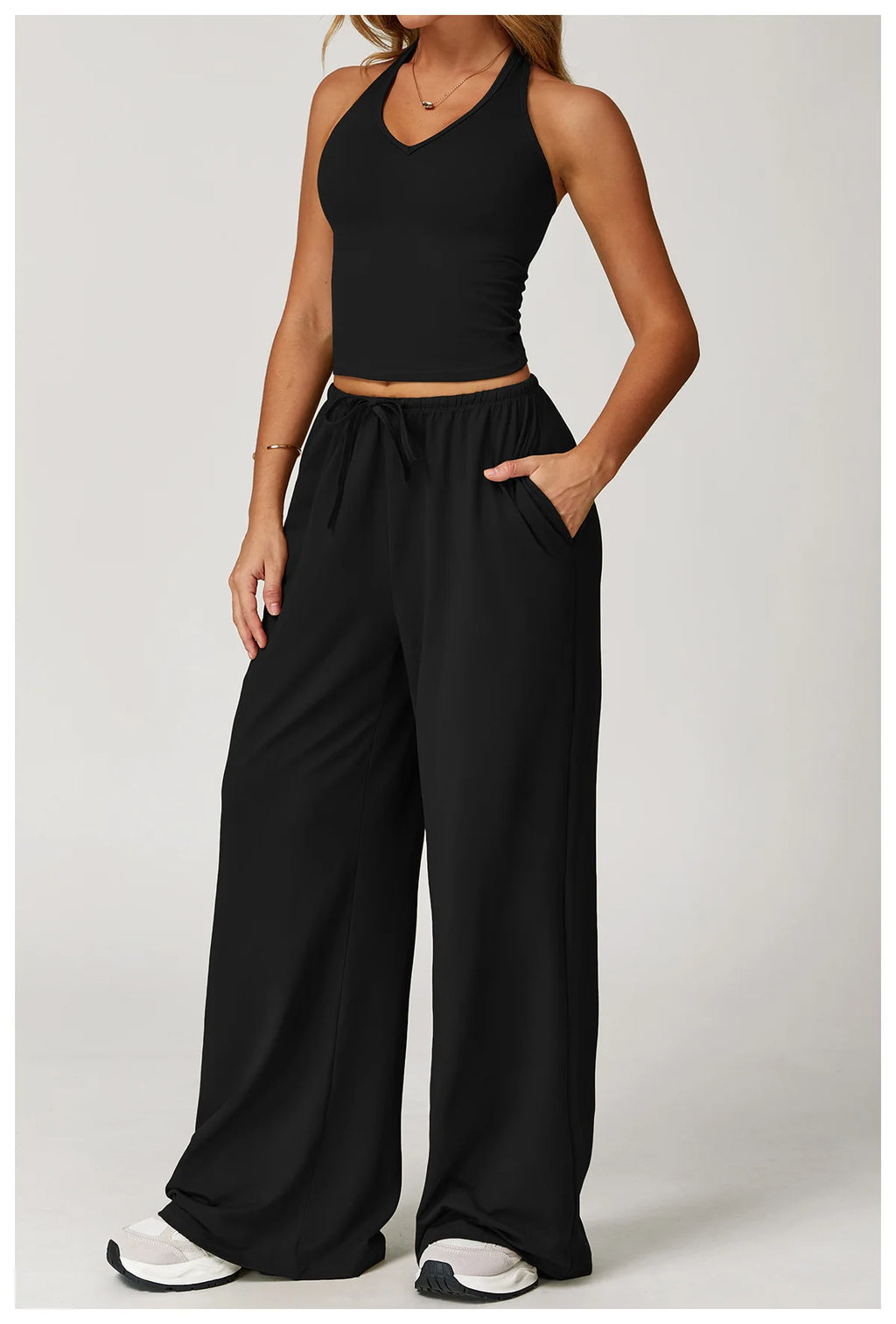 Stylish Xooie Fit tank top and baggy pants workout outfit for comfortable fitness sessions