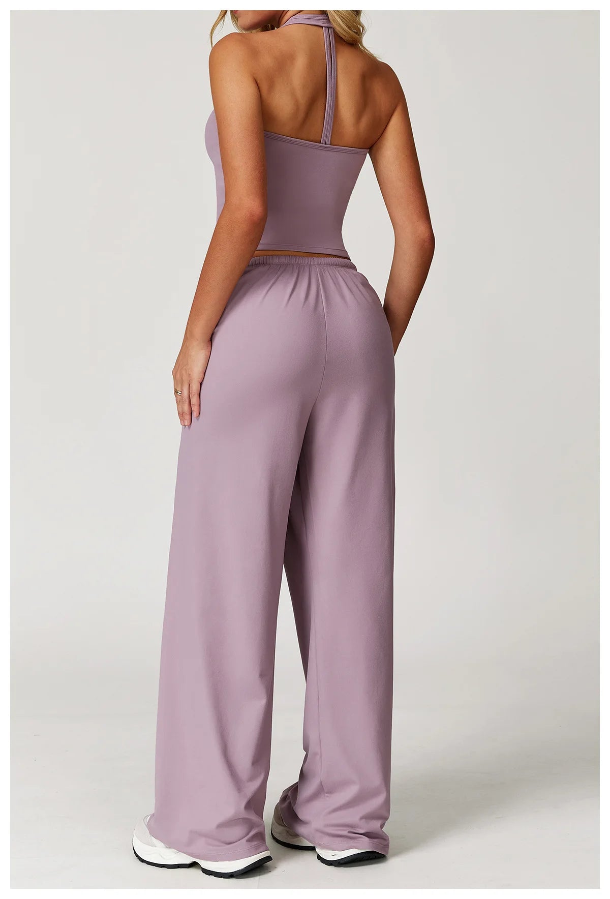 Xooie Fit Two-Piece Set featuring a tank top and baggy pants workout outfit in soft lavender color