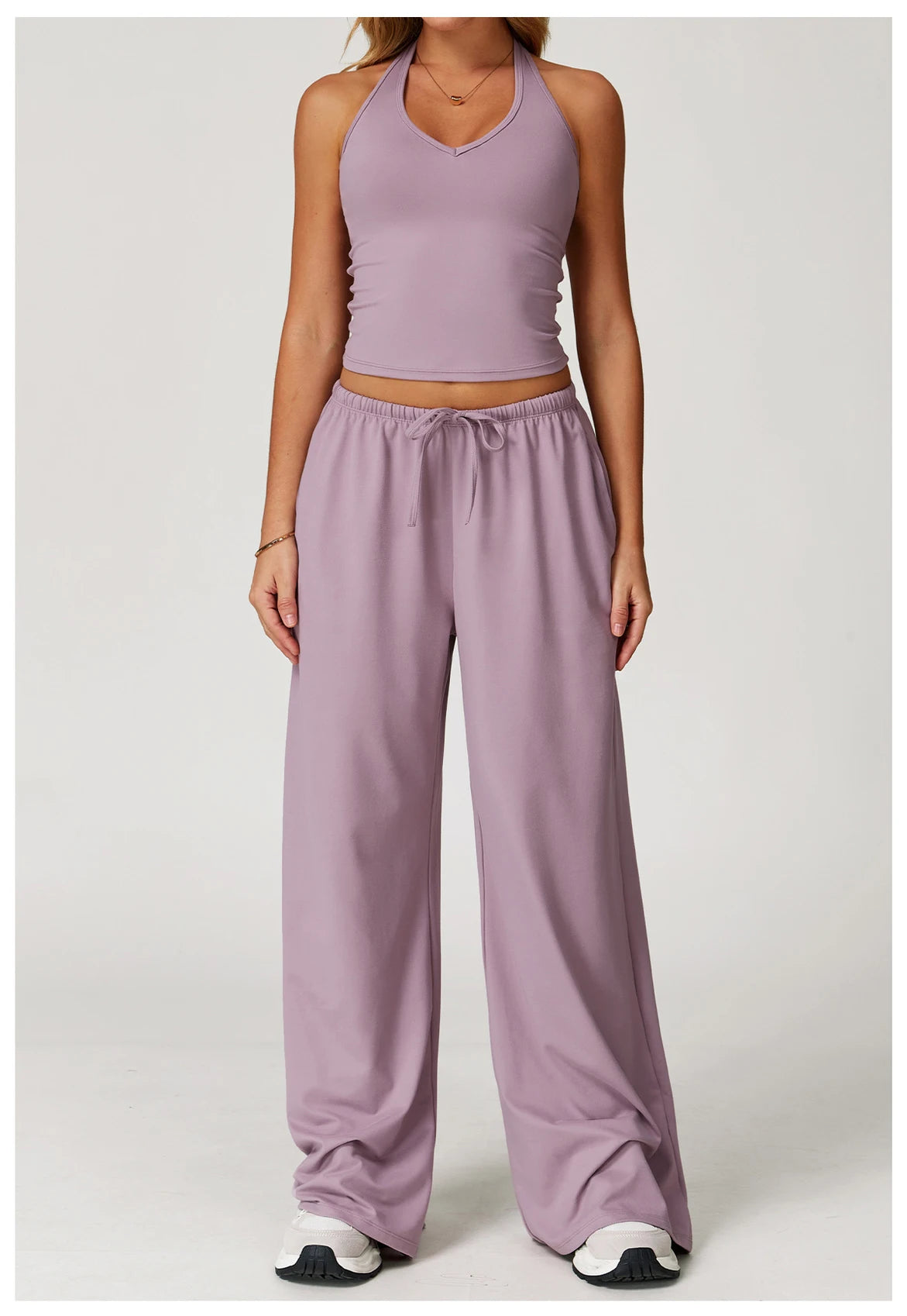 Xooie Fit tank top and baggy pants workout outfit in soft lavender for comfortable training sessions