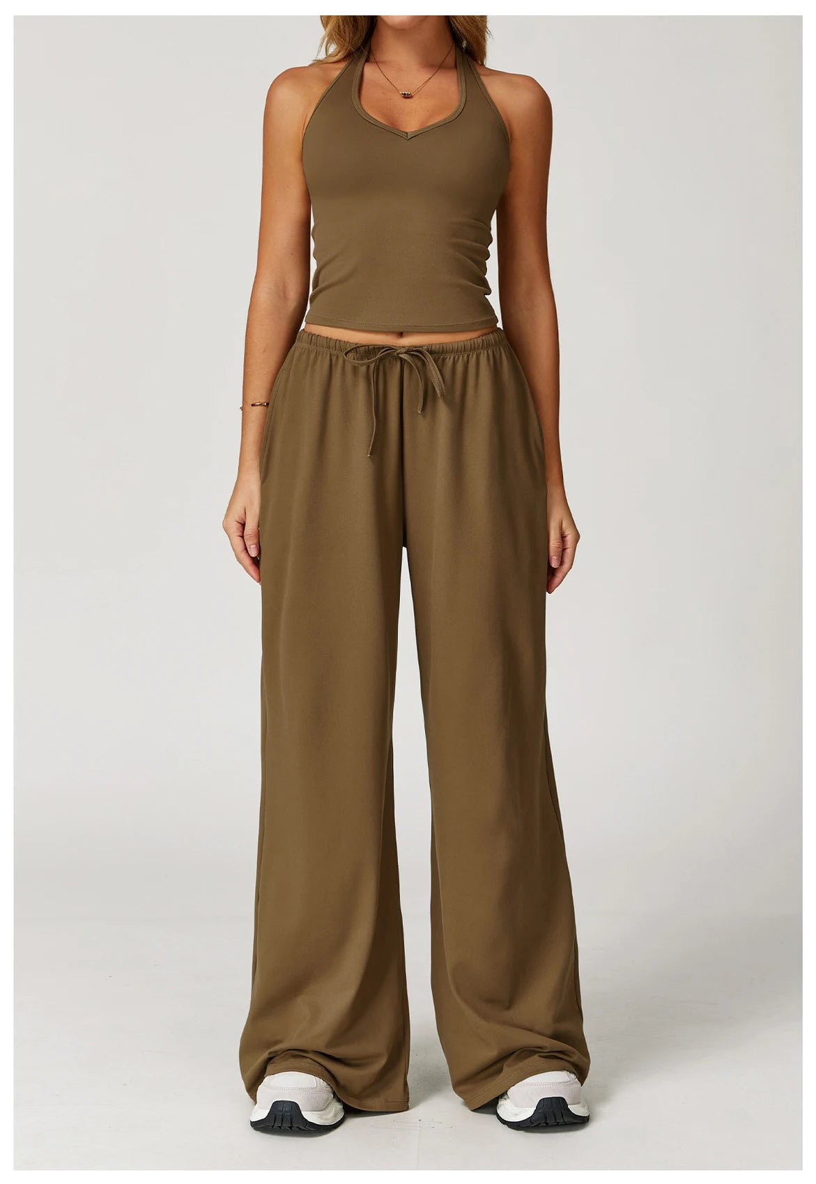 Xooie Fit Two-Piece Set featuring a tank top and baggy pants workout outfit for comfortable training