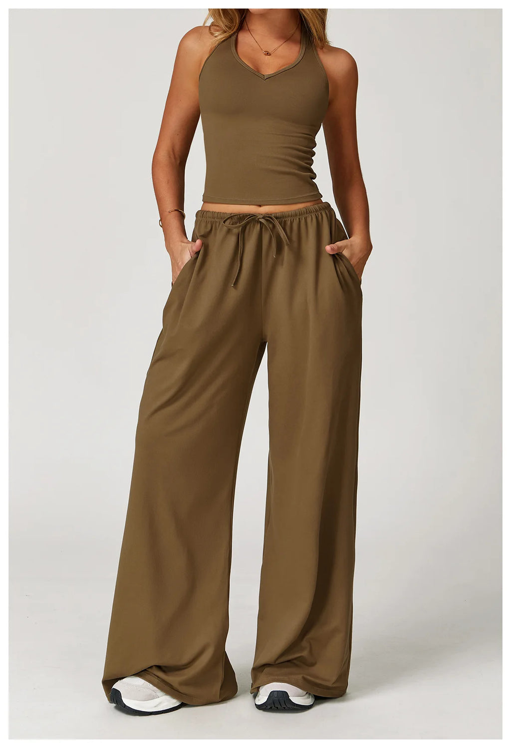 Xooie Fit two-piece set featuring a tank top and baggy pants workout outfit in olive green for comfortable exercise