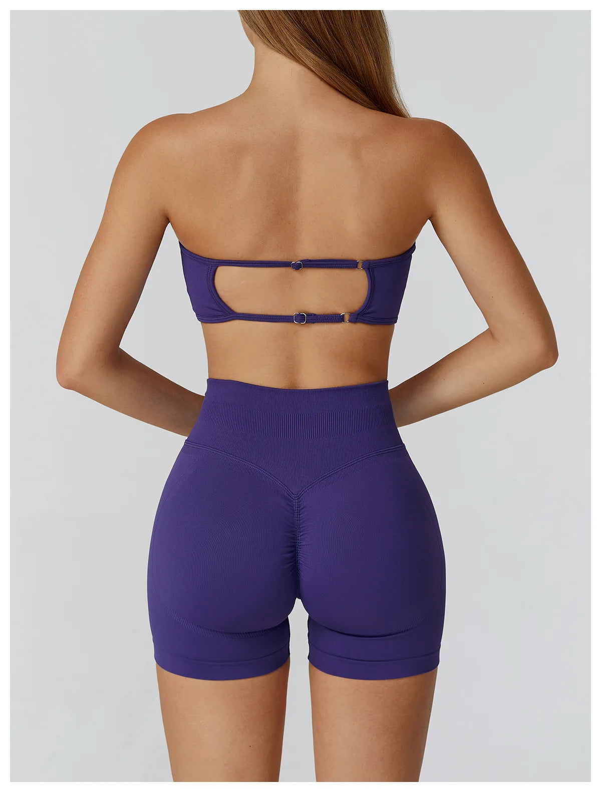 Purple strapless workout set for women featuring a stylish back design and high-waisted shorts