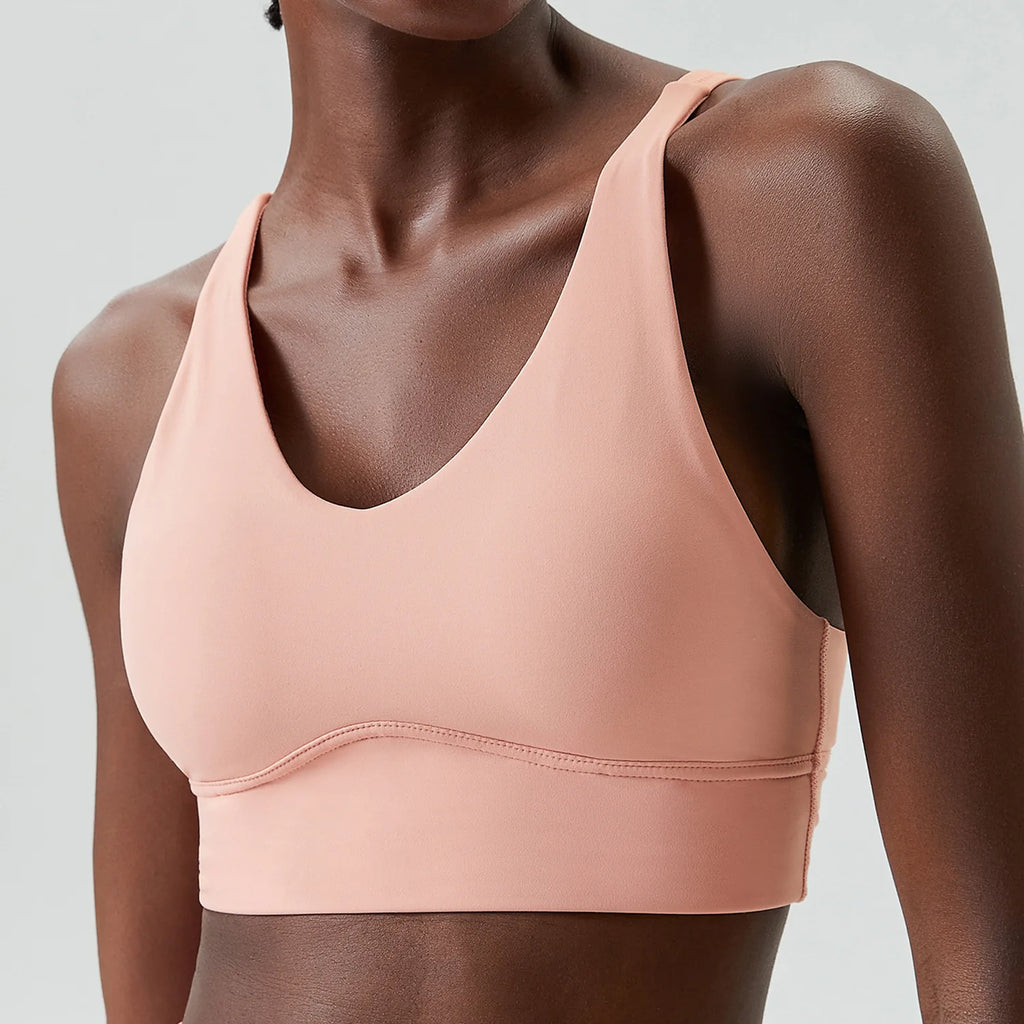 Xooie Fit X-Strap Sports Bra in Soft Pink for Comfortable Athletic Support