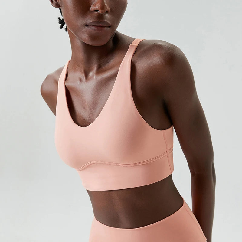 Xooie Fit X-Strap Sports Bra in Soft Pink for Comfortable Support During Workouts