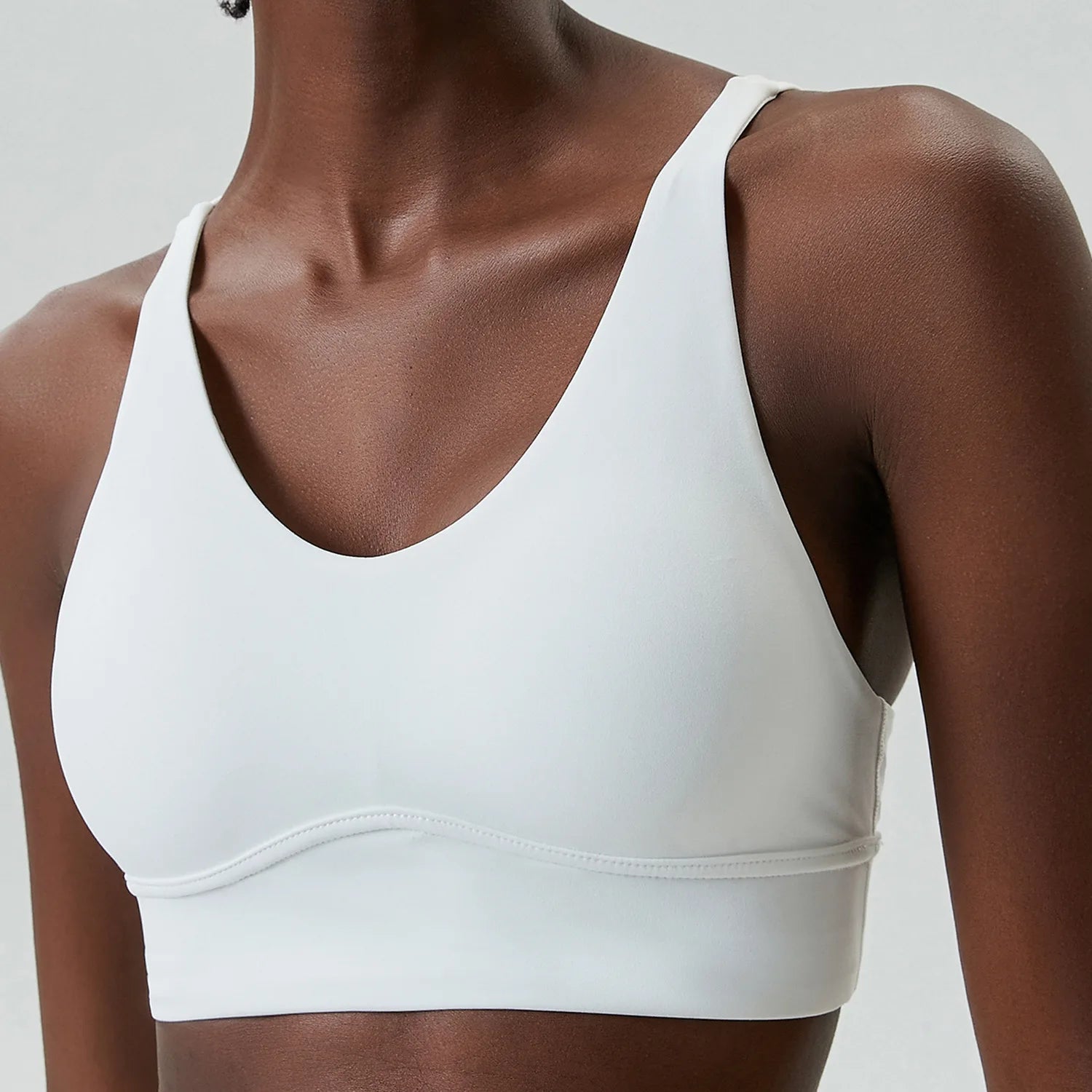 Xooie Fit X-strap sports bra in white designed for comfort and support during workouts