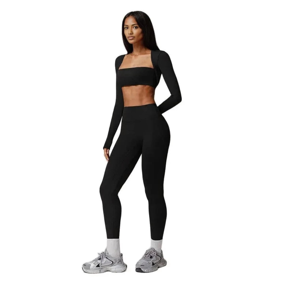 Xooie Fit 3-piece workout outfit in black featuring a crop top and high-waisted leggings side